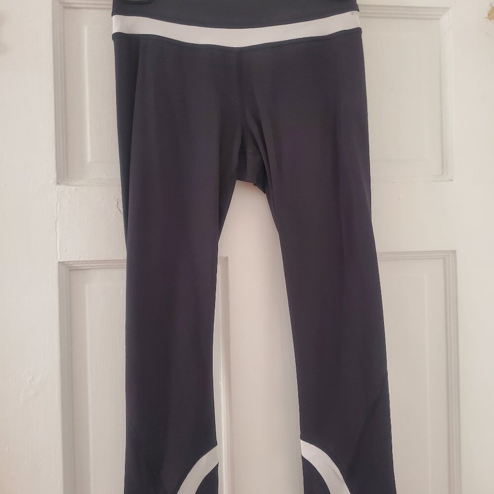 Lululemon Run: Inspire Crop Black / White leggings, back pocket, size 4